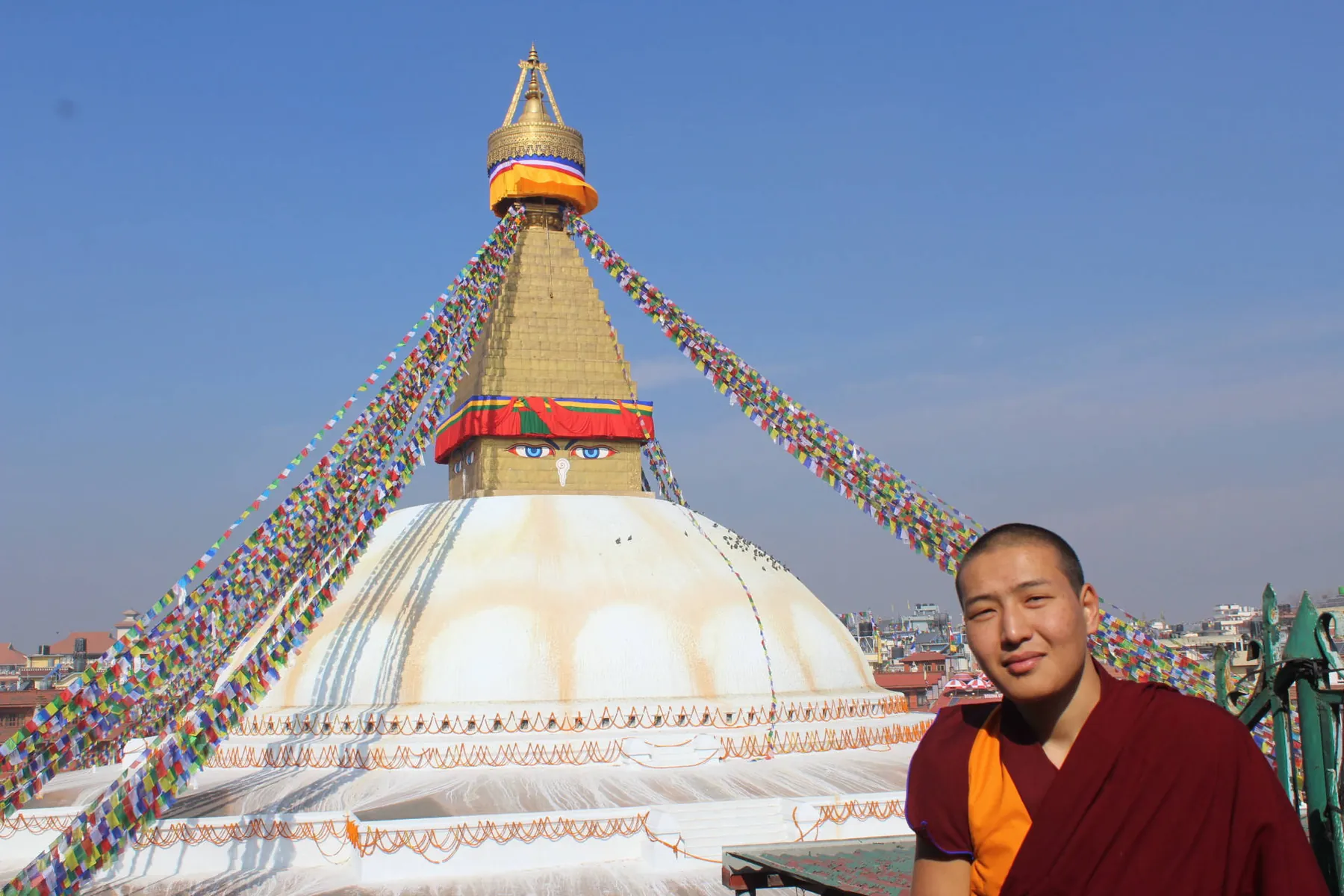 Darpa Pandita in monastic robes at the Boudhanath stupa in Kathmandu